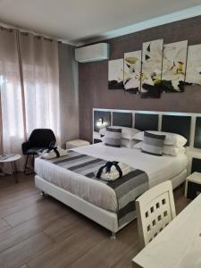 Postel nebo postele na pokoji v ubytování Albis Rooms Guest House