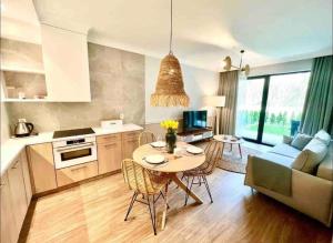 Kuchyň nebo kuchyňský kout v ubytování Luksusowy Apartament Niechorze 122