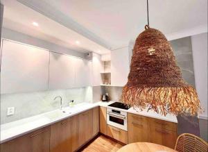 Kuchyň nebo kuchyňský kout v ubytování Luksusowy Apartament Niechorze 122