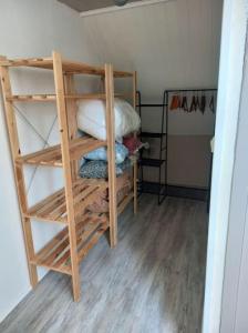 a set of bunk beds in a room at Maison de vacances à Cayeux-sur-Mer in Cayeux-sur-Mer
