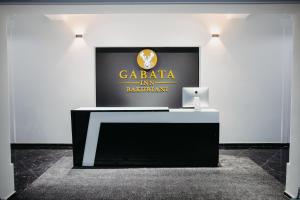 Majutusasutuses GABATA INN olev sertifikaat, autasu, silt või muu dokument