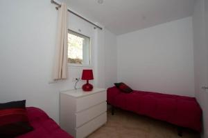 Posteľ alebo postele v izbe v ubytovaní Aparthotel l'Heretat