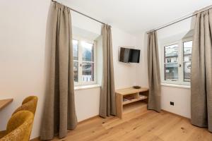 TV a/nebo společenská místnost v ubytování Residence Kugler