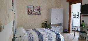 A bed or beds in a room at Le Rustiche Foresteria