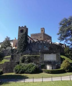 an old castle on top of a hill at Guelfi6 Poppi in Poppi