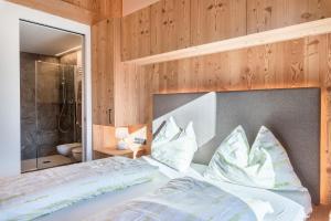 Postel nebo postele na pokoji v ubytování Guntschöllerhof Rotwand