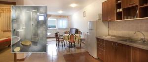 a kitchen with a table and chairs in a room at Apartment in Novalja with sea view, terrace, air conditioning, WiFi 3565-5 in Novalja