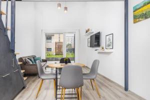 A television and/or entertainment centre at Venus Apartments - Westside residence