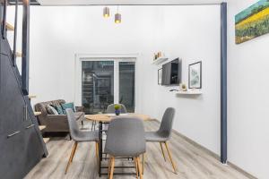 A television and/or entertainment centre at Venus Apartments - Westside residence