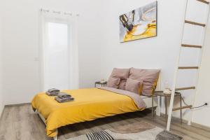 Posteľ alebo postele v izbe v ubytovaní Venus Apartments - Westside residence