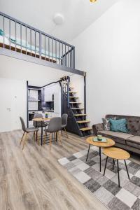 A seating area at Venus Apartments - Westside residence