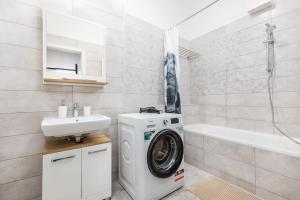 A bathroom at Venus Apartments - Westside residence