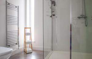 a bathroom with a glass shower and a toilet at Ruadh in Ose +41 photos
