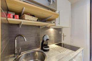 Kuchyň nebo kuchyňský kout v ubytování Le Winter + 13 fotografií