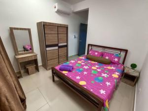Katil atau katil-katil dalam bilik di Gharoda Kajang Homestay