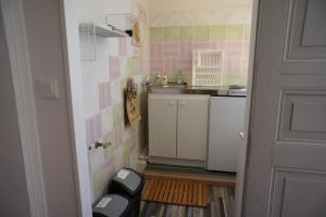 Kuchyň nebo kuchyňský kout v ubytování MAS TERRE Chambres d'Hôtes