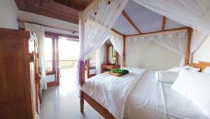 Ein Bett oder Betten in einem Zimmer der Unterkunft Sama Sama Amed