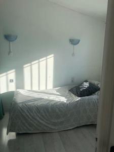 Una cama o camas en una habitación de Les Micocouliers - Spacieuse maison,4chambres ,avec Jardin- Parking -Wifi