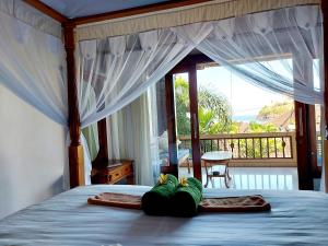 Ein Bett oder Betten in einem Zimmer der Unterkunft Sama Sama Amed