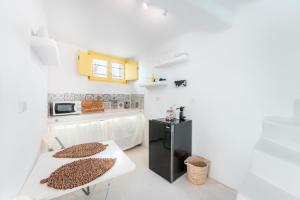 Кухня или мини-кухня в Anelia House
