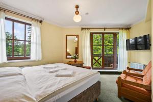 Postel nebo postele na pokoji v ubytování David Wellness Hotel + 27 fotografií