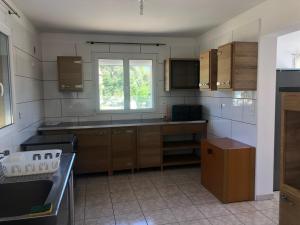 Kuchyňa alebo kuchynka v ubytovaní Superbe Appartement Vue Montagne Proximités Grandes Surfaces