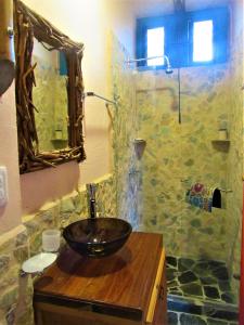 a bathroom with a sink and a shower at La Madremonte in Filandia