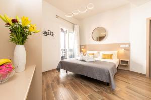 Postel nebo postele na pokoji v ubytování Suncanarias Hotel Adeje Plaza