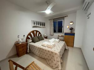 Postel nebo postele na pokoji v ubytování Villa Hortensia - Primera linea playa la concha