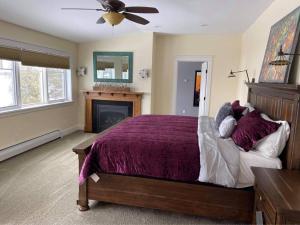a bedroom with a bed and a fireplace at Smooth Sailing on Lake Champlain in NY! in Plattsburgh