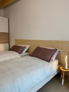 Кровать или кровати в номере Brothers' Suites