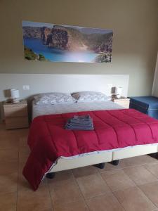 Postel nebo postele na pokoji v ubytování B&b Paolo e Daniela
