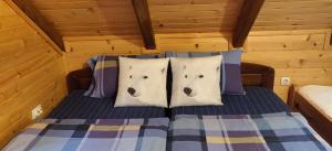 Un pat sau paturi într-o cameră la Lodge House Tara