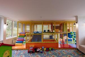 a room with a play room with a play set at Highland in Yablunytsya