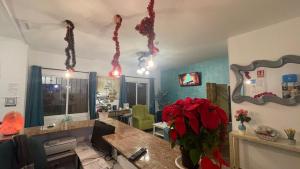 Telewizja i/lub zestaw kina domowego w obiekcie Hotel Boutique Andalucia