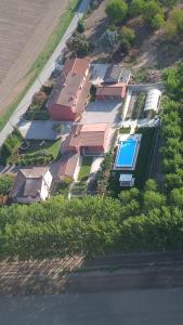 an overhead view of a row of houses with a swimming pool at RB Bed & Breakfast in Gaiba