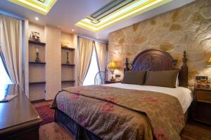 Katil atau katil-katil dalam bilik di Hotel Kassaros