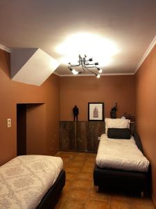 Кровать или кровати в номере Sofiya Apartment