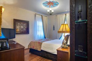 Katil atau katil-katil dalam bilik di Hotel Kassaros