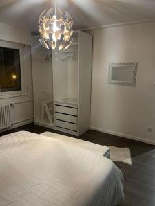 Ένα ή περισσότερα κρεβάτια σε δωμάτιο στο Appartement Cosy Strasbourg