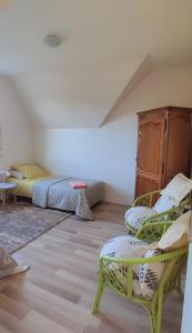 Ліжко або ліжка в номері Magnifique maison familiale située à MORLAIX