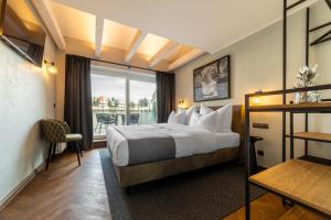 The Viaduct - Suites & More客房内的一张或多张床位