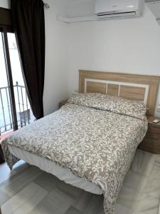 Cama o camas de una habitación en Remedios Property