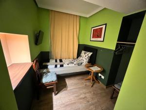 Łóżko lub łóżka w pokoju w obiekcie Ratuszowa Noclegi