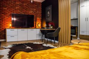 Kuchyňa alebo kuchynka v ubytovaní ApartamentySnu, Wola Premium I z parkingiem