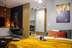 Kuchyňa alebo kuchynka v ubytovaní ApartamentySnu, Wola Premium I z parkingiem + 12 fotografií