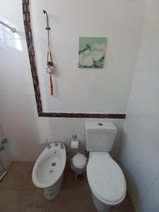 Ett badrum på Hostería Los Naranjos