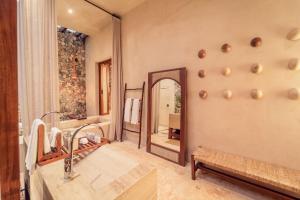 Postel nebo postele na pokoji v ubytování Oriundo Luxury Nature Villas