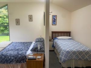 Postel nebo postele na pokoji v ubytování Quail Haven Queen Room + 14 fotografií