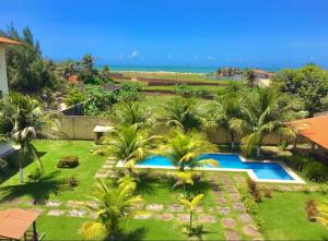 Uma vista da piscina em Apartamento em Taiba-CE com vista para o mar ou nas proximidades